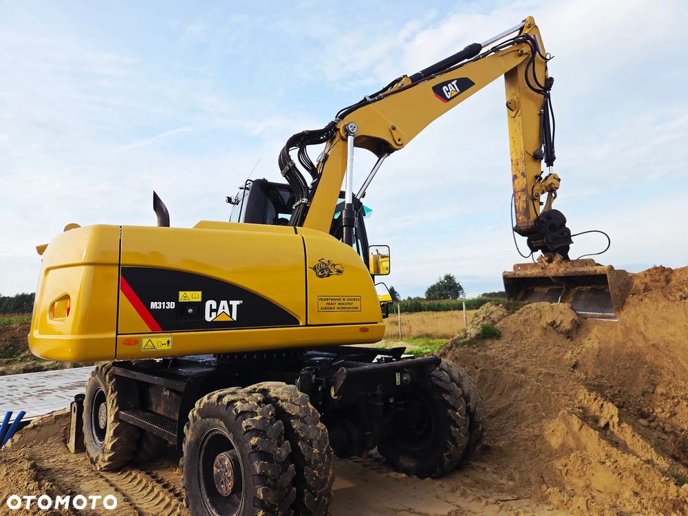 Caterpillar M313 D - 22