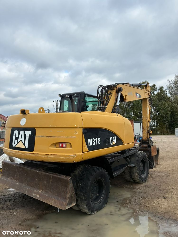 Caterpillar M318C - 19
