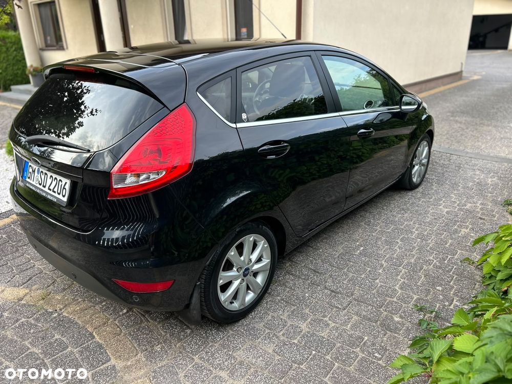 Ford Fiesta 1.4 Ghia - 13