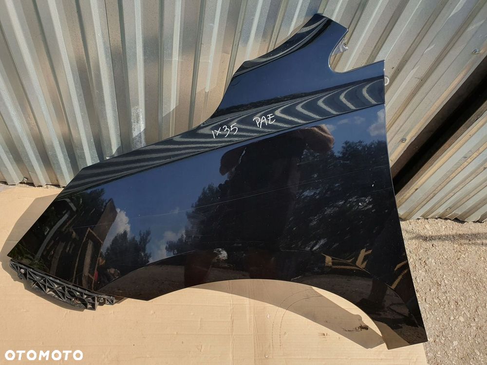 BŁOTNIK LEWY przód przedni Hyundai ix35 lakier PAE czarny - 1