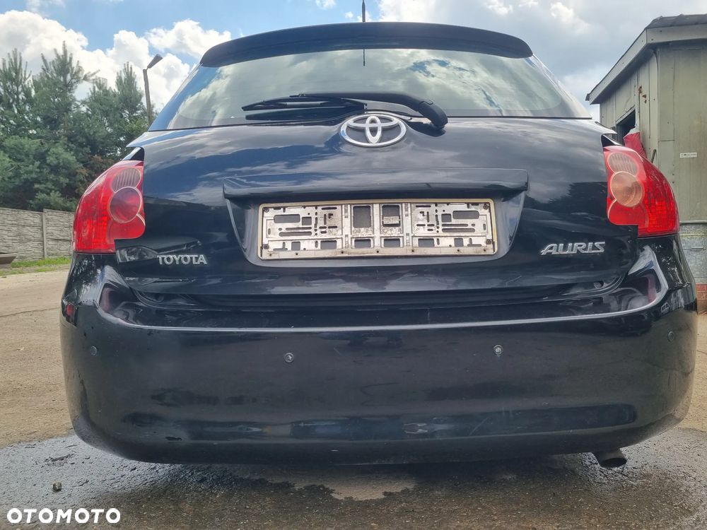 TOYOTA AURIS I 06-09 2008 r. 5D HB 209 zderzak tył tylny PDC * - 1