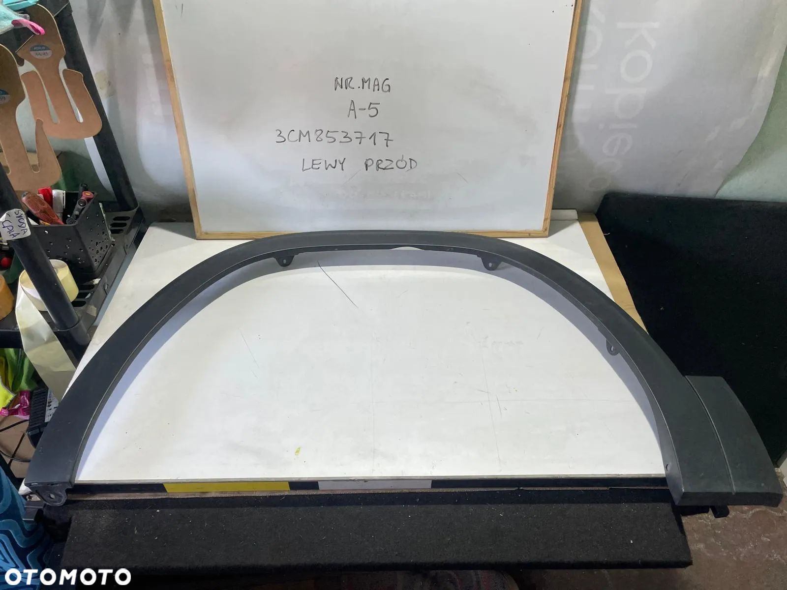 NAKŁADKA BŁOTNIKA LEWA PRZÓD VW ATLAS 3CM853717 - 1