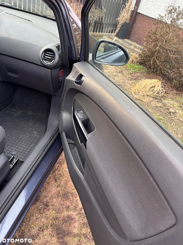 Opel Corsa 1.2 16V Cosmo - 14