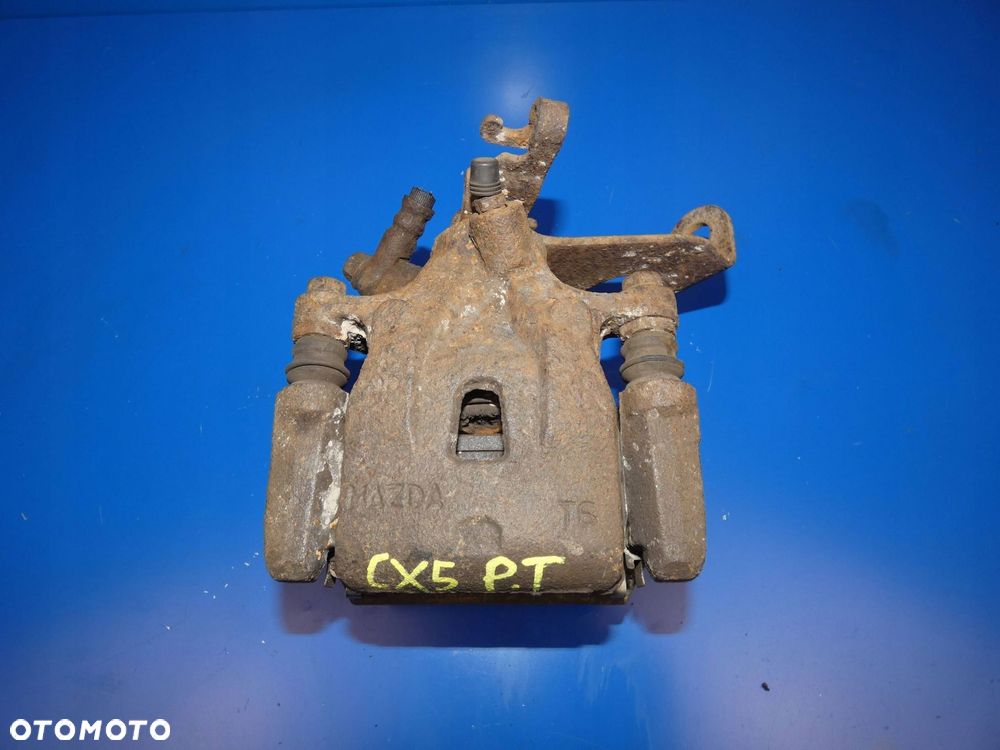 MAZDA CX5 CX-5 ZACISK HAMULCOWY PRAWY TYŁ TYLNY - 1