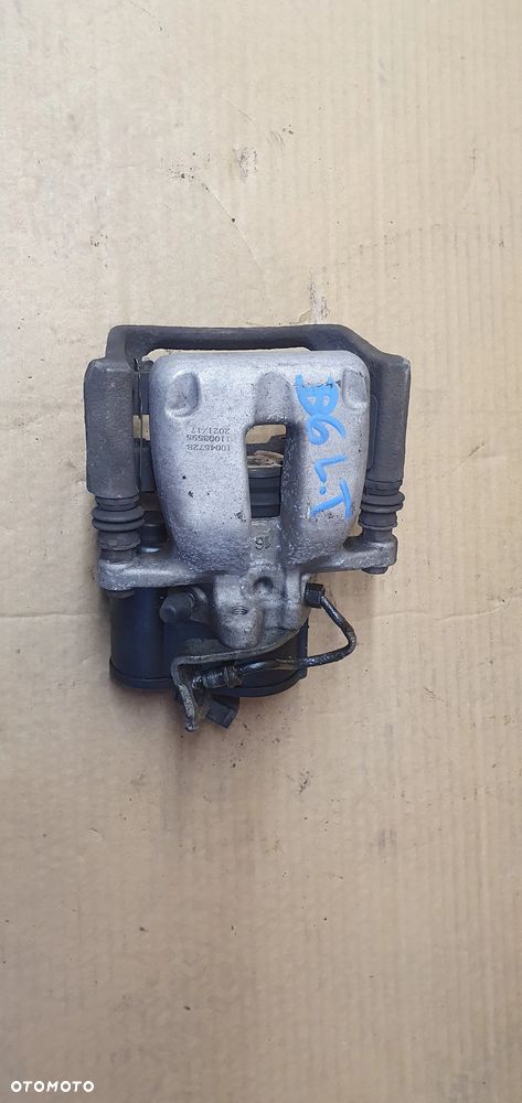 Zacisk hamulcowy lewy tył tylny lewy VW Passat B6 - 1
