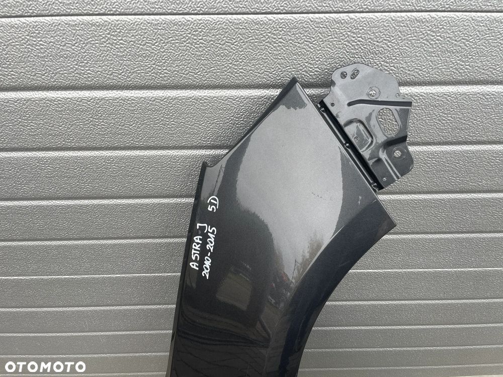 BŁOTNIK PRZEDNI PRAWY OPEL ASTRA J 5D  2010-2015 - 2