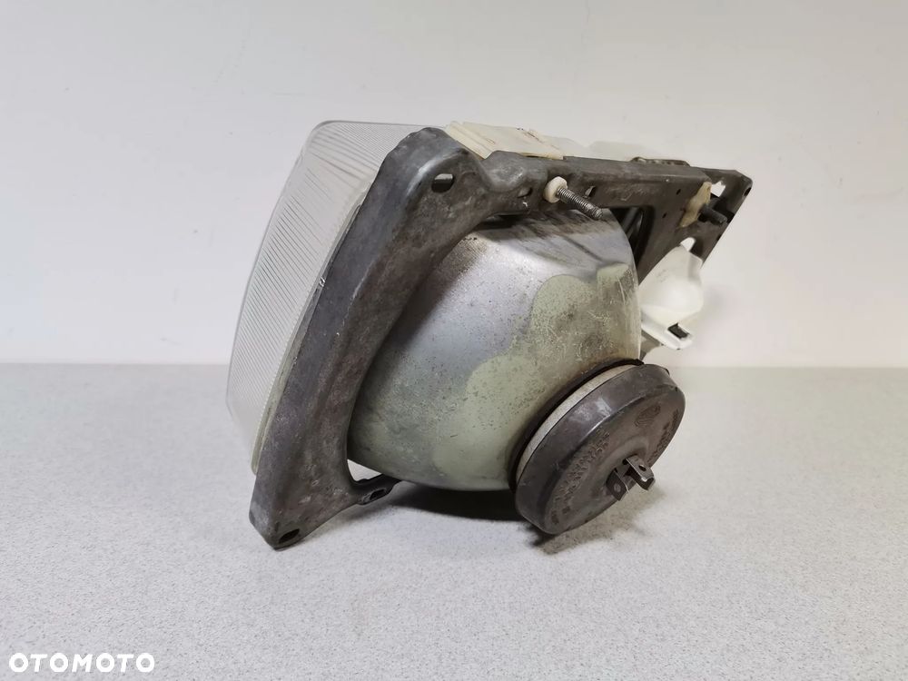 Lampa Reflektor LEWY VOLKSWAGEN PASSAT B2 80-88 HELLA Oryginał - 5