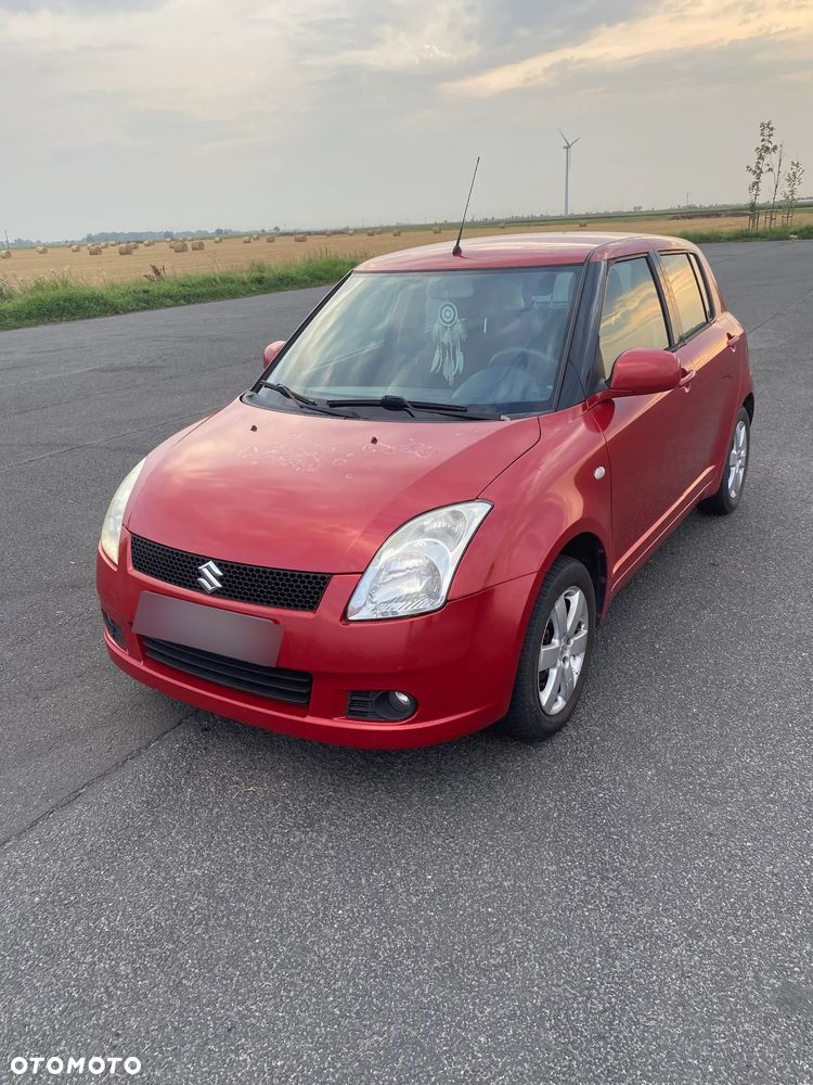 Suzuki Swift 1.3 GS / Premium - 1