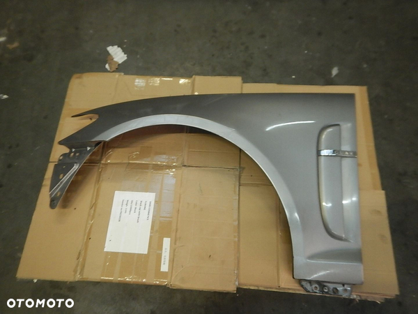 BLOTNIK PRZOD LEWY JAGUAR XF X250 2007-