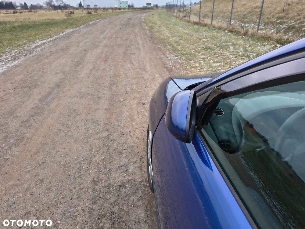 Seat Ibiza 1.4 16V Signo - 30