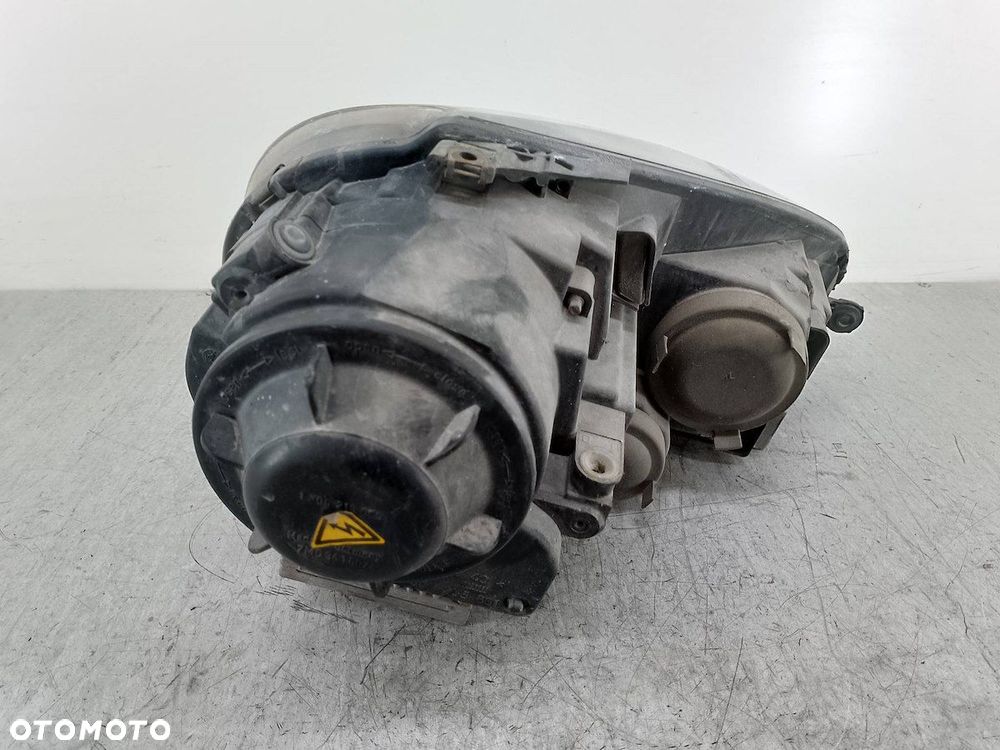 LAMPA PRZÓD LEWA XENON VW JETTA V 1T0907391 0302497271 1307329090 - 7