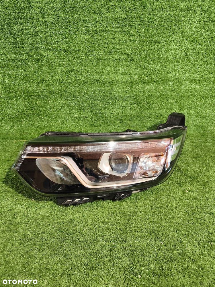 REFLEKTOR LEWY PRZÓD SSANGYONG TIVOLI LIFT 19- SOCZEWKA NR.989 - 2