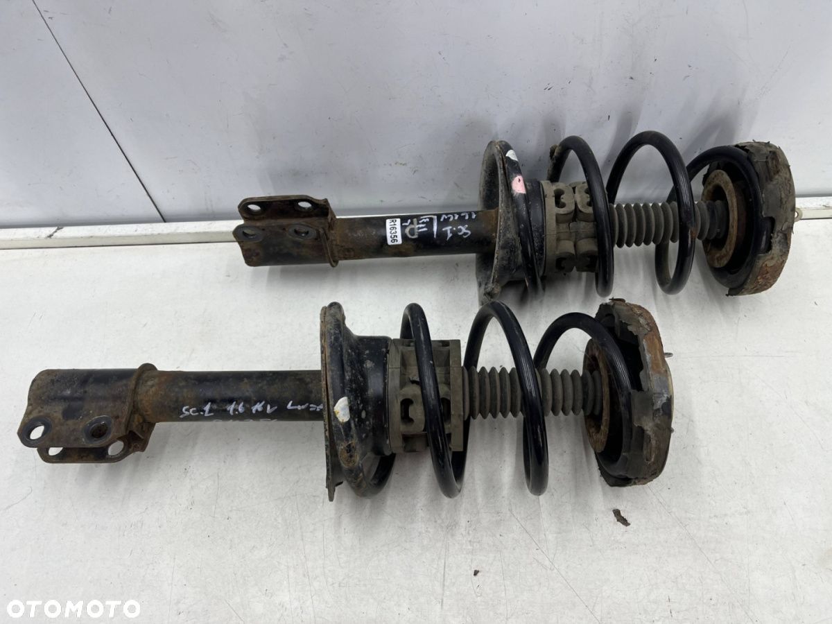 Amortyzator Renault Scenic 1 I 96-03r BENZYNA przedni PRAWY LEWY mcpherson sprężyna przód 7700430760 - 1