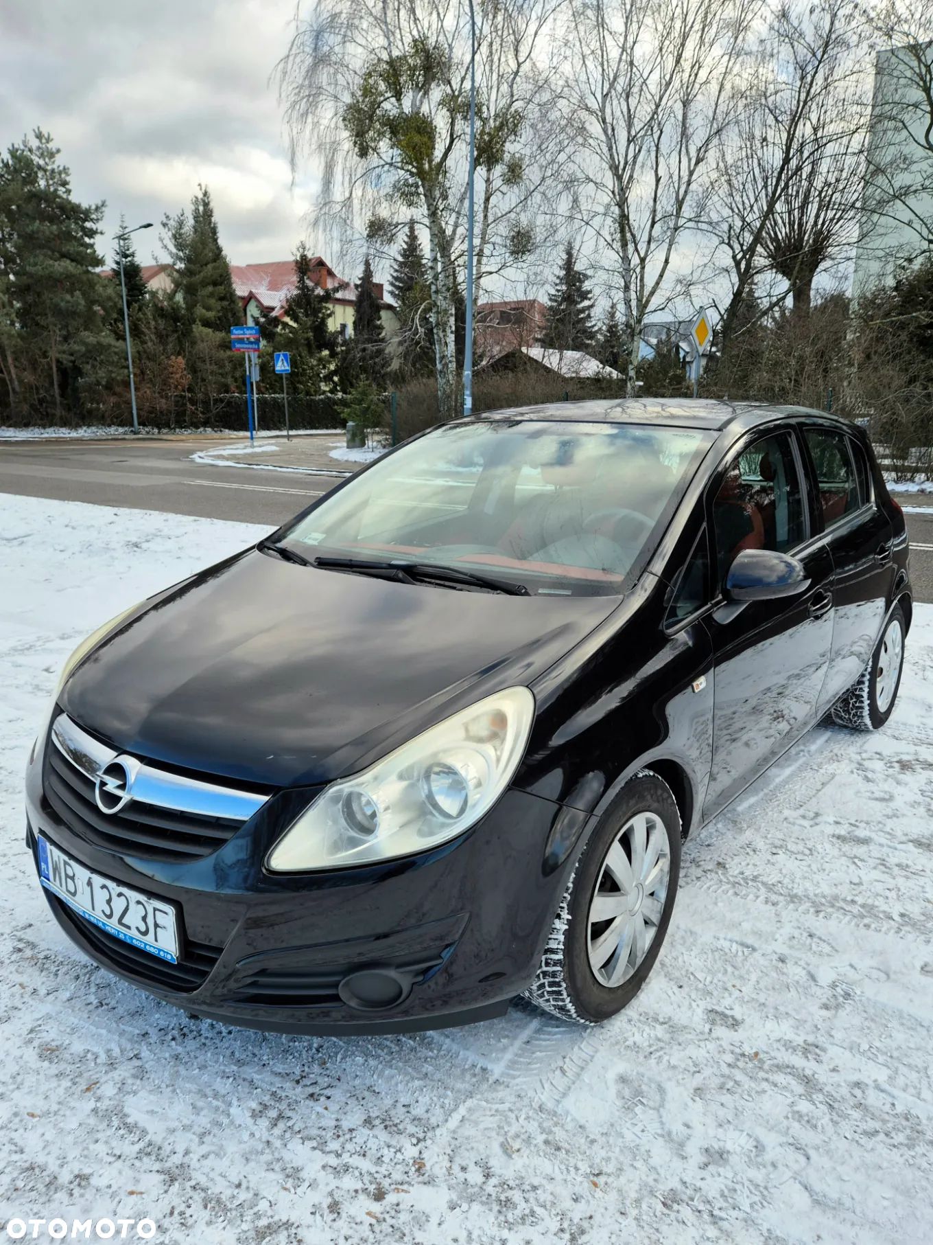 Opel Corsa 1.4 16V Enjoy - 1