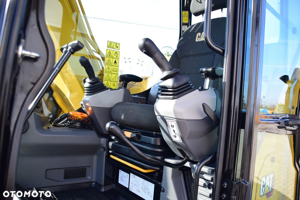 Caterpillar 310 - 18