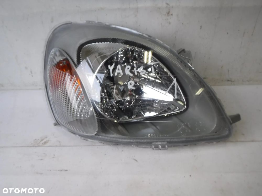 toyota yaris 1 lampa przód prawa przednia nowa - 1