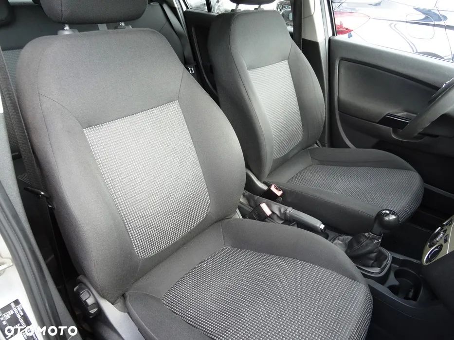 Opel Corsa 1.2 16V Enjoy - 11
