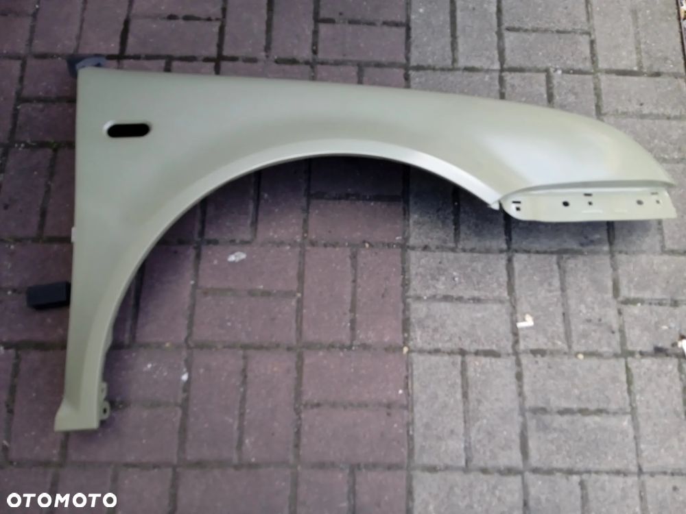 BŁOTNIK PRAWY VOLKSWAGEN BORA 98-05 NOWY ZAMIENNIK - 1