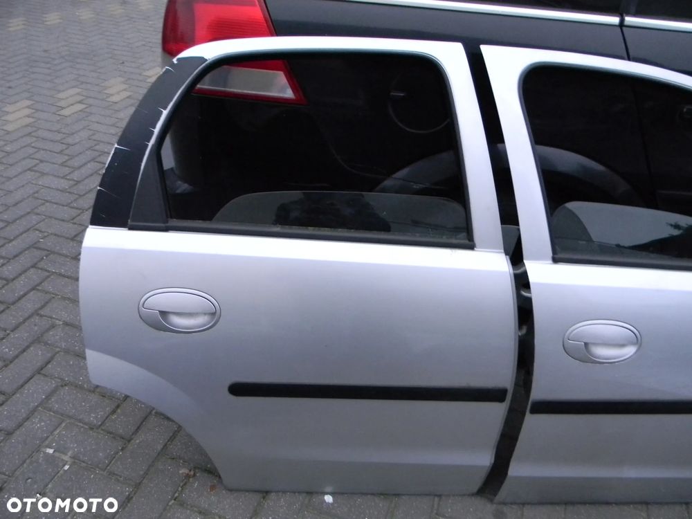 drzwi lewe prawe tył przód OPEL CORSA C Z147 5D - 15