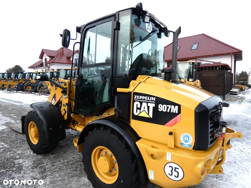 Caterpillar CAT 907M Z Niemiec / Wyjątkowo Wyposażony / 35km/h / 3.050mtg / - 24