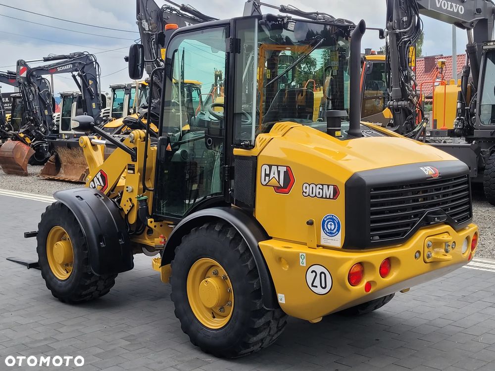 Caterpillar 906M / nowy model 2022r. / łyżka otwierana + widły / SUPER STAN - 6