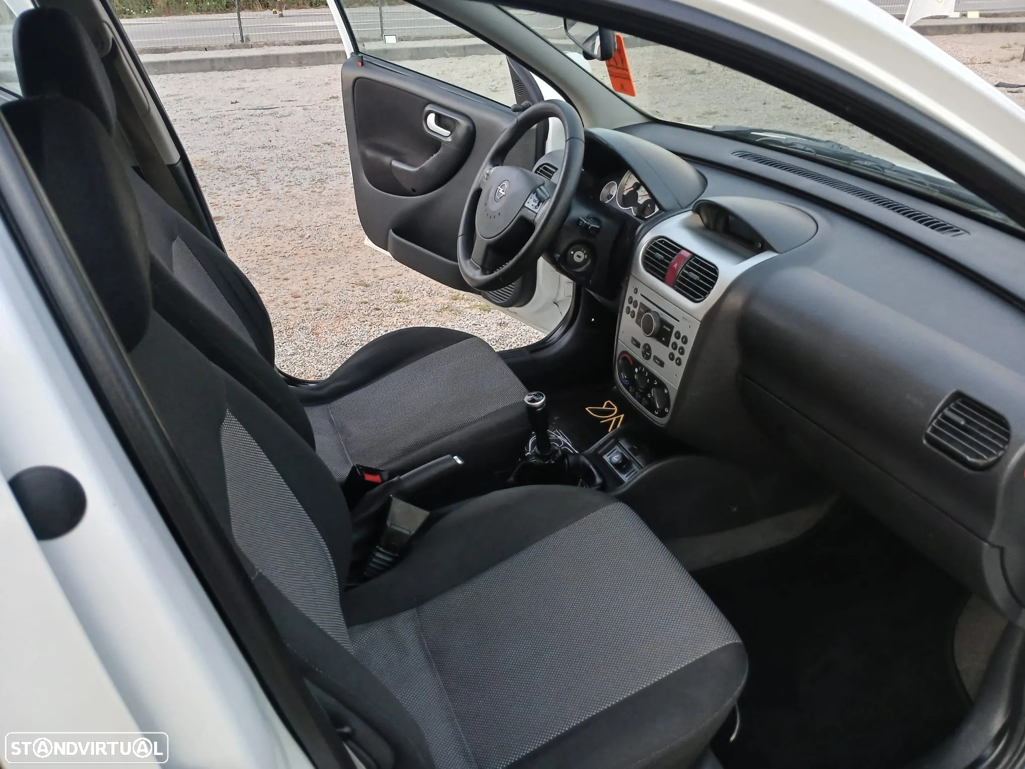 Opel Corsa 1.2 16V Cosmo - 8