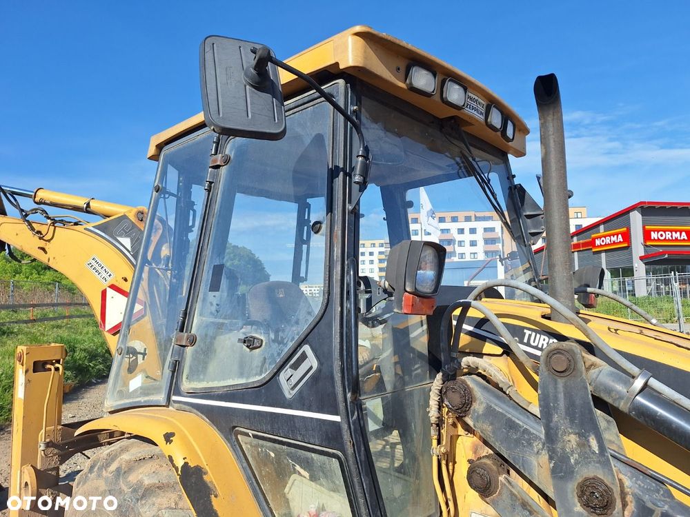 Caterpillar 428 C 4X4 - 37