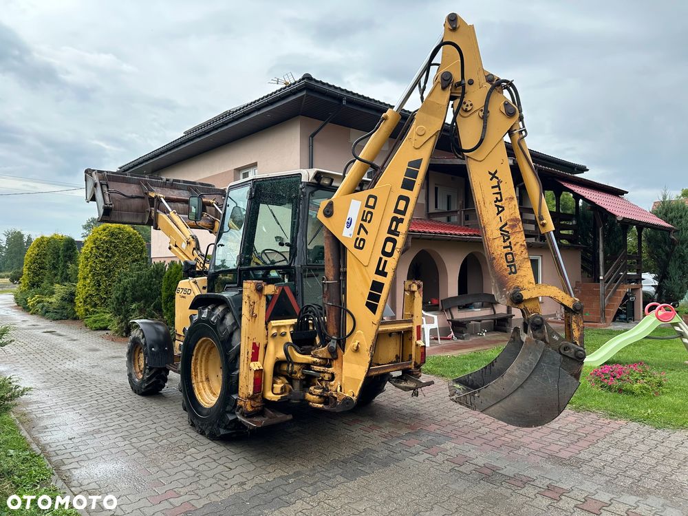 Caterpillar CAT 428D 2002 rok 4x4 moc 80KM - 2