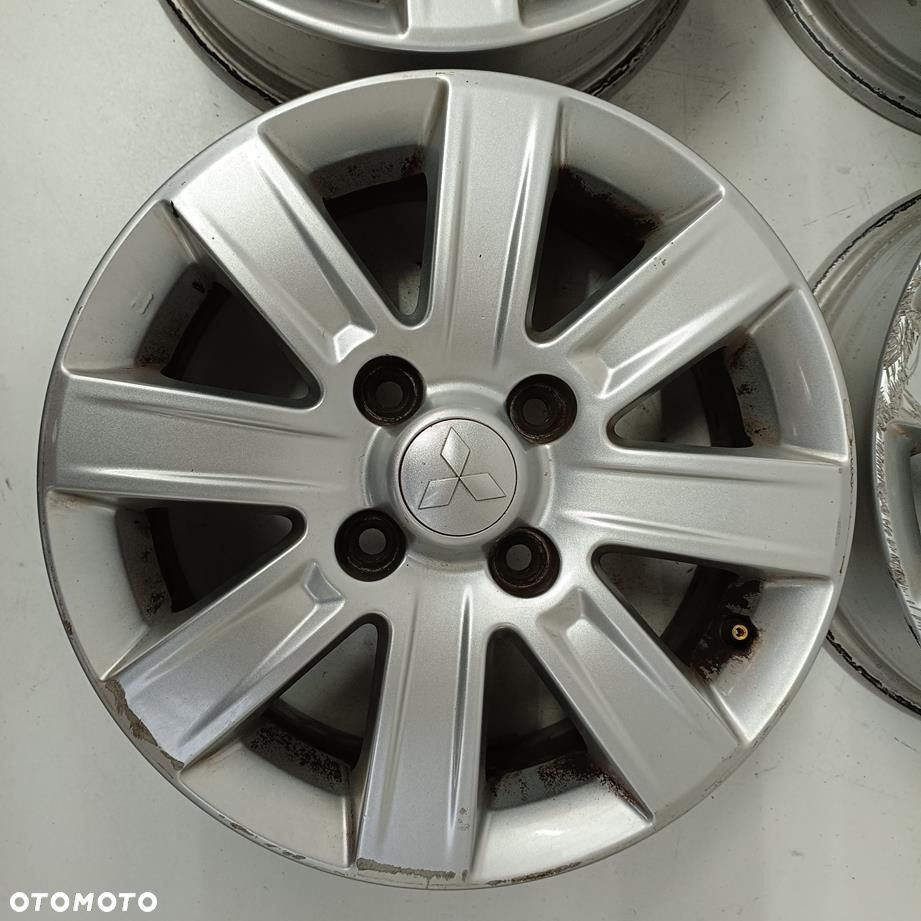 Alufelgi 4x114,3 15 Mitsubishi Colt 4250A756 4szt (F7882) - 3
