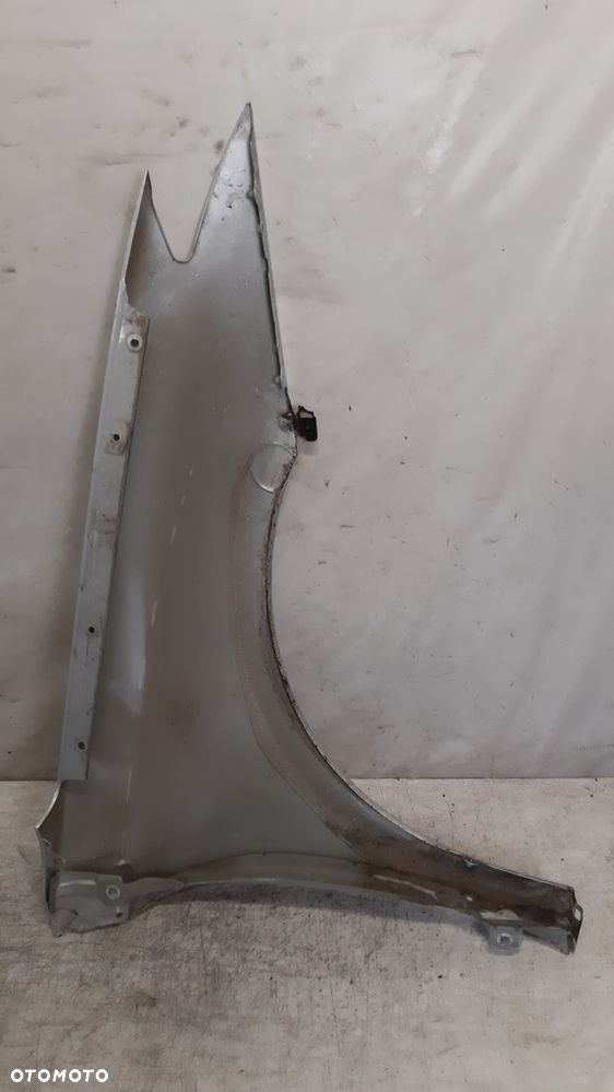 * RENAULT LAGUNA III 3 BŁOTNIK  PRZEDNI PRZOD LEWY TED69 SREBRNY - 4