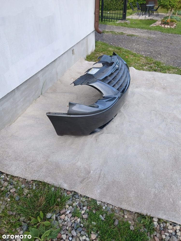 ZDERZAK PRZEDNI CHRYSLER GRAND VOJAGER IV LIFT ROK 05/07 - 2