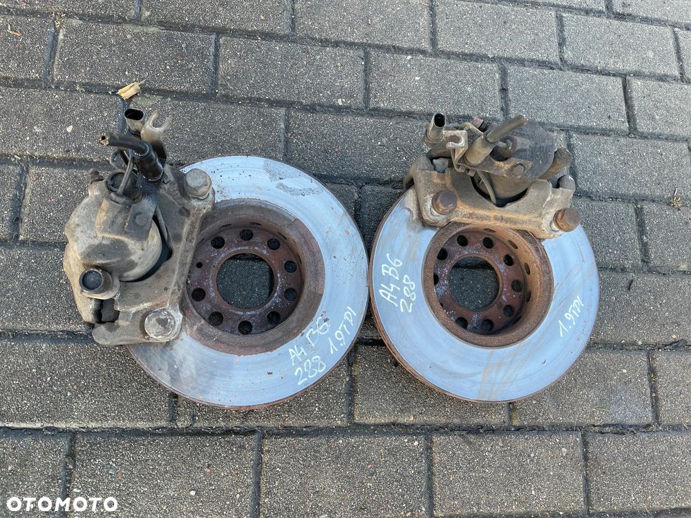AUDI A4 01- B6 B7 ZACISK HAMULCOWY TYŁ LEWY PRAWY TARCZE KLOCKI KOMPLET - 1