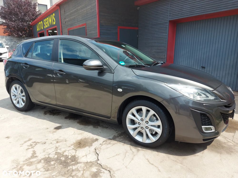Mazda 3 2.0 MZR DISI Sports-Line - 2