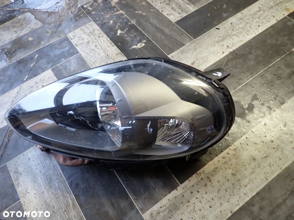 FIAT PUNTO EVO LAMPA LEWY PRZÓD 89102044SX - 2