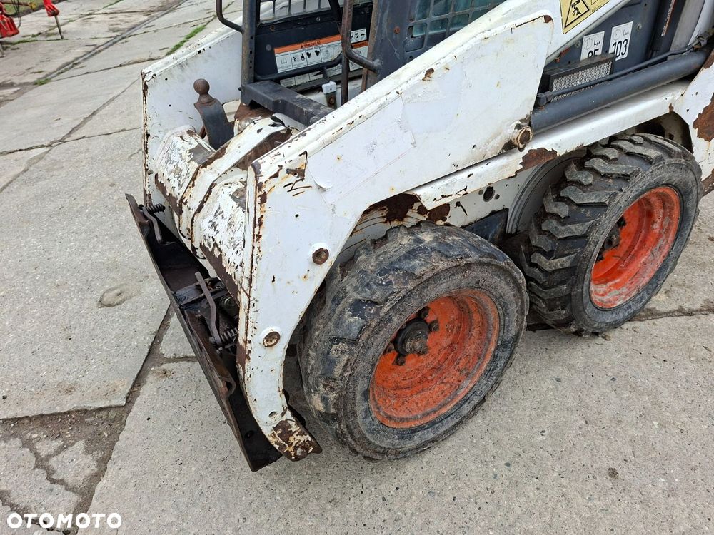 Bobcat 553 4X4 + Melroe Ingersoll-Rand 725S B/H - 34