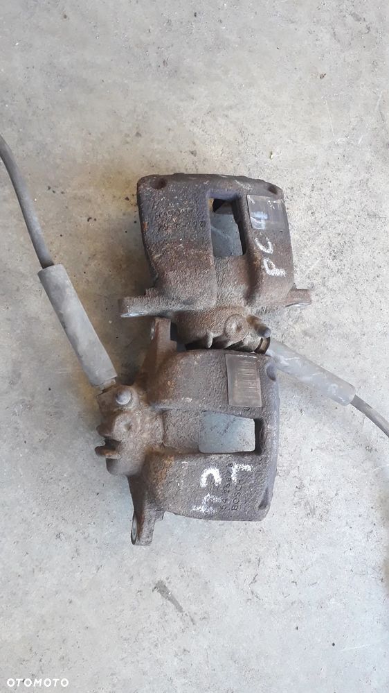 citroen c4 I lift 1.6 VTI zacisk przód lewy prawy - 1