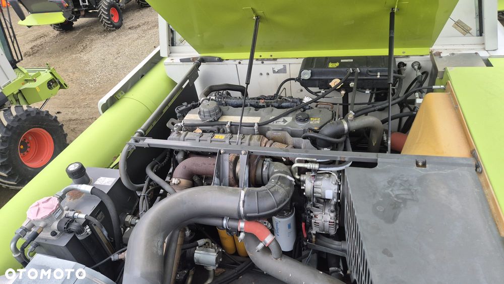 Claas Lexion 660 z hederem - 17