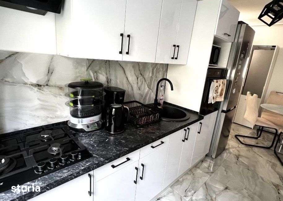 Ap 2 camere si balcon, pivnita, et 2 din 4, mobilat, utilat, zona buna — fotografia 1