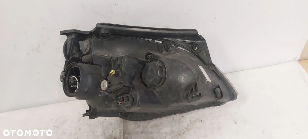 .  PRZOD PRZEDNIA LAMPA LEWA KIA CARENS 3 - 4