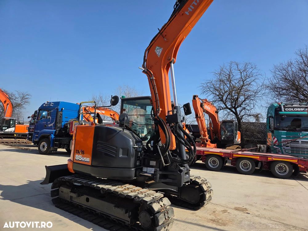Hitachi ZX85, 2022, 2.491h, 8,6t, CUPLA RAPIDA HIDRAULICA+3 CUPE NOI, LAMA NIVELARE, ad sapare 5m, inst picon, instalatia rotire atasament, senile cauciuc, AC, Camera spate, ridica 4,5t, latime 2,2m, CA NOU, posibilitate leasing 4 ani-PROMOTIE 62.900 EUR+Tva - 20