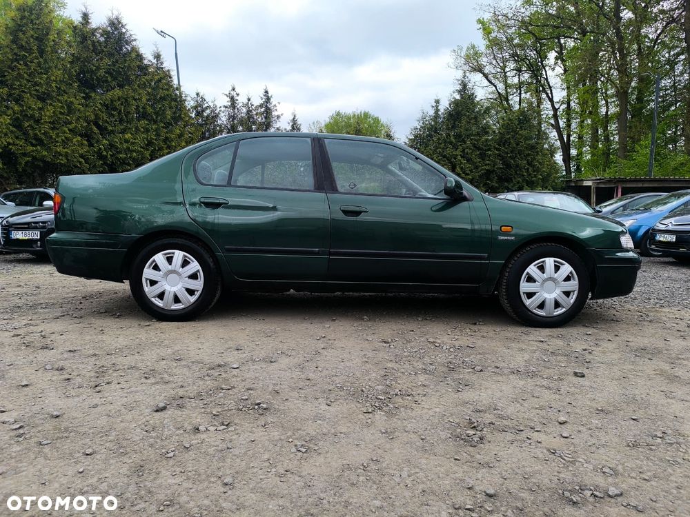 Nissan Primera 1.6 Motion - 9