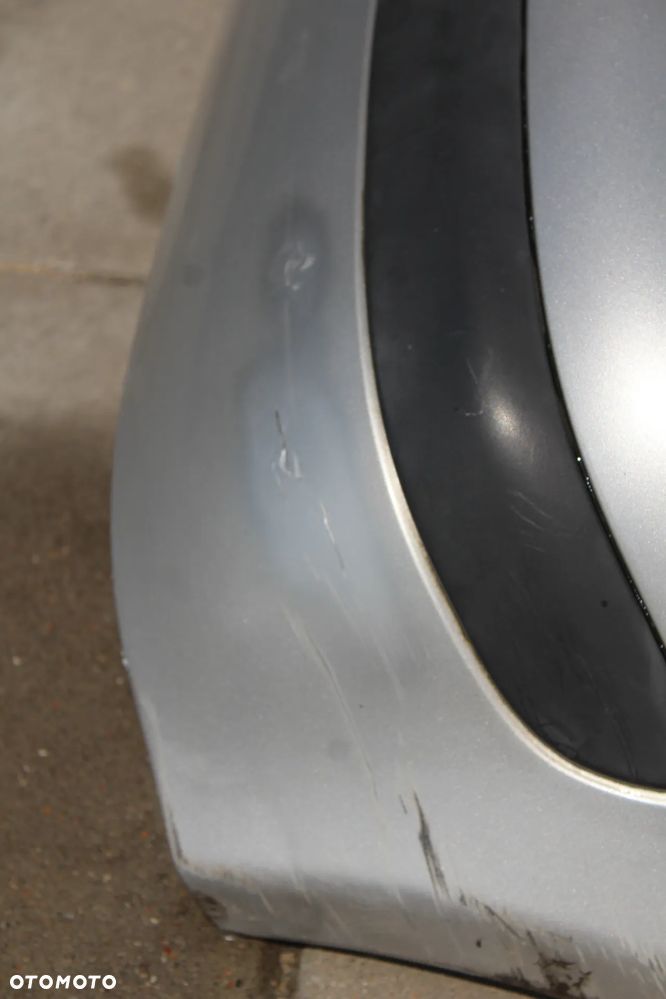 ZDERZAK TYŁ TOYOTA YARIS I LIFT KOLOR 1E7 - 7