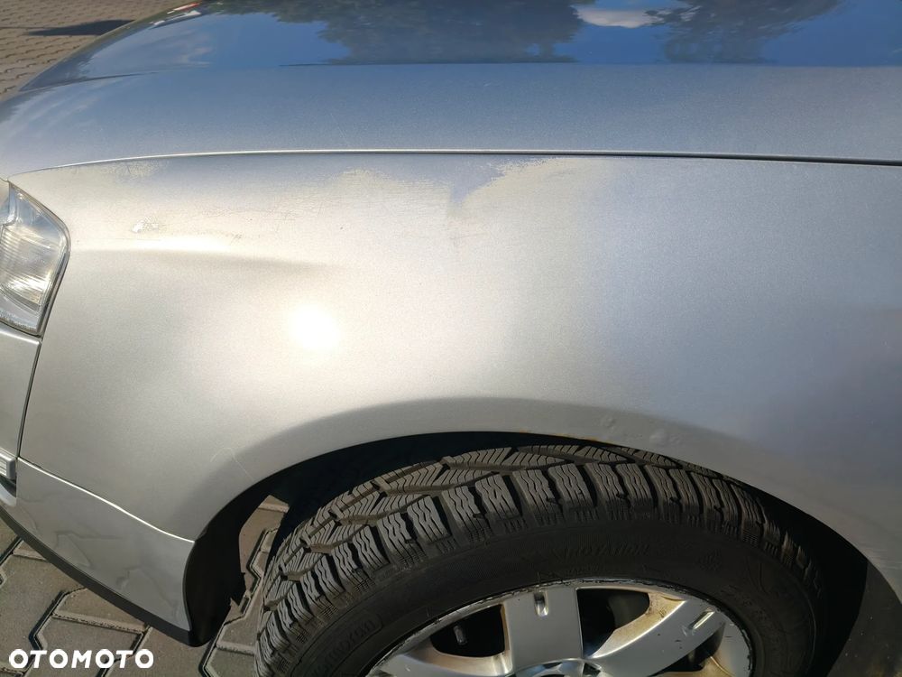 Volkswagen Passat 1.9 TDI Highline - 7