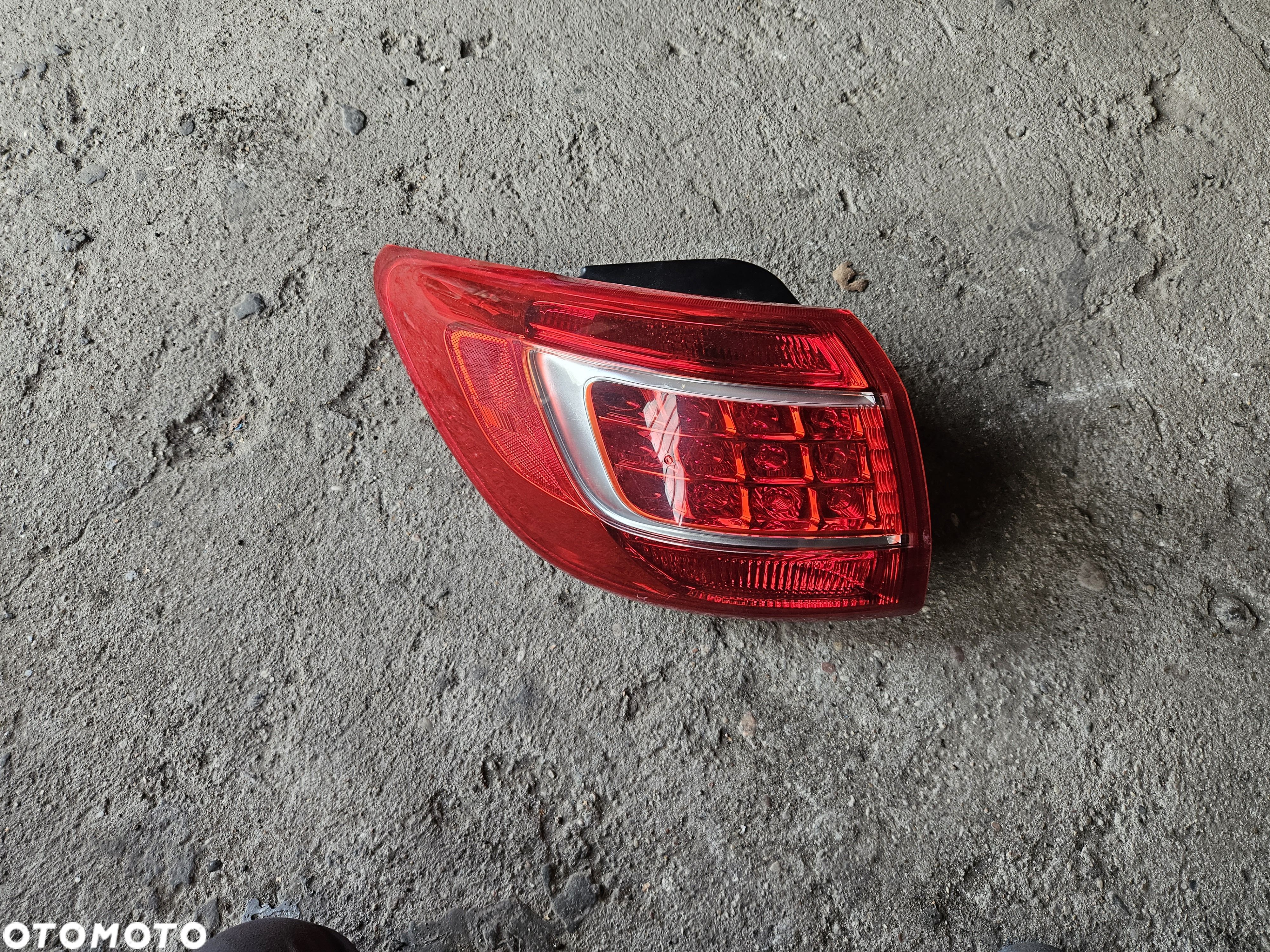 Kia Sportage III lampa tylna lewa w blotnik - 1