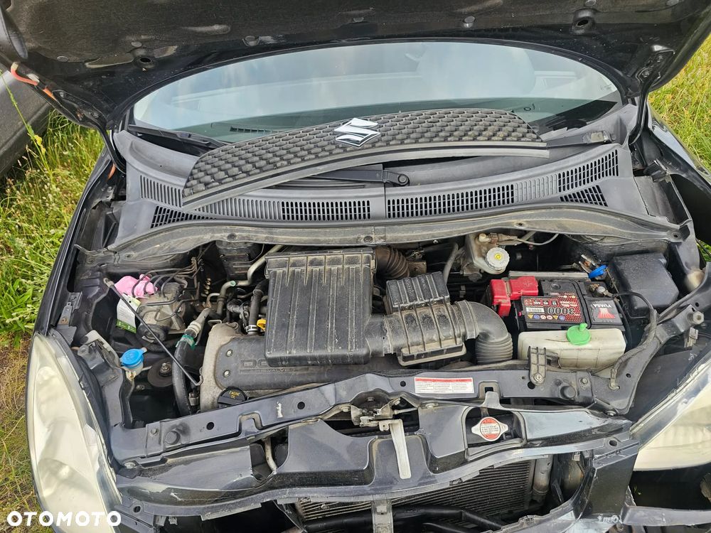 Suzuki Swift 1.3 Club - 9