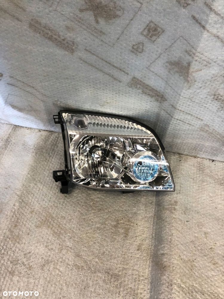 REFLEKTOR PRAWY NISSAN X-TRAIL T30 DEPO