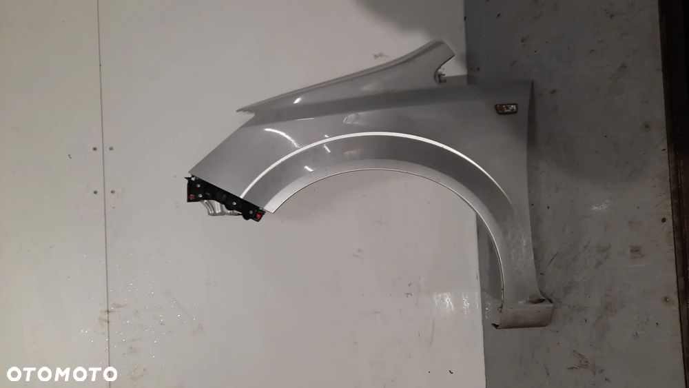 BŁOTNIK PRZÓD PRZEDNI LEWY OPEL ZAFIRA B Z176 SREBRNY - 1