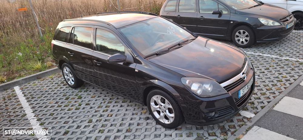 Opel Astra Caravan 1.7 CDTi Cosmo - 1