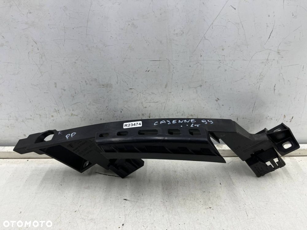 Ślizg Porsche Cayenne III 9y LIFT 23r.- prawe przednie mocowanie reflektora okular wspornik pasa - 4