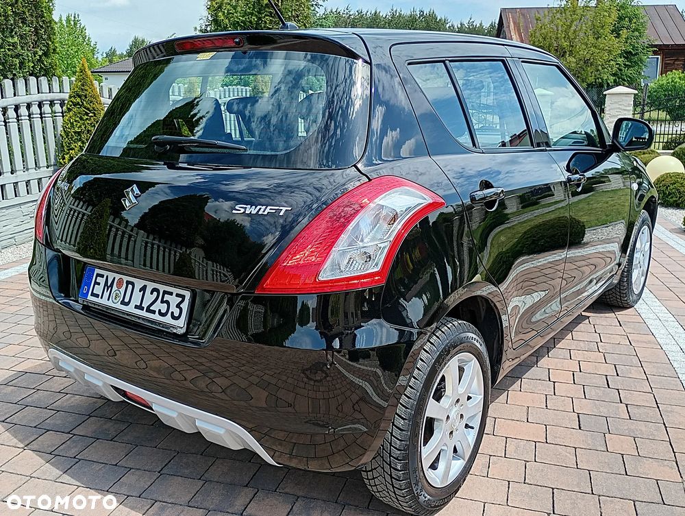 Suzuki Swift 1.2 4x4 Club - 12